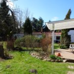 Ferienhof im Schlumm - Terrasse mit Blick in den liebevoll gestalteten Gartenbereich